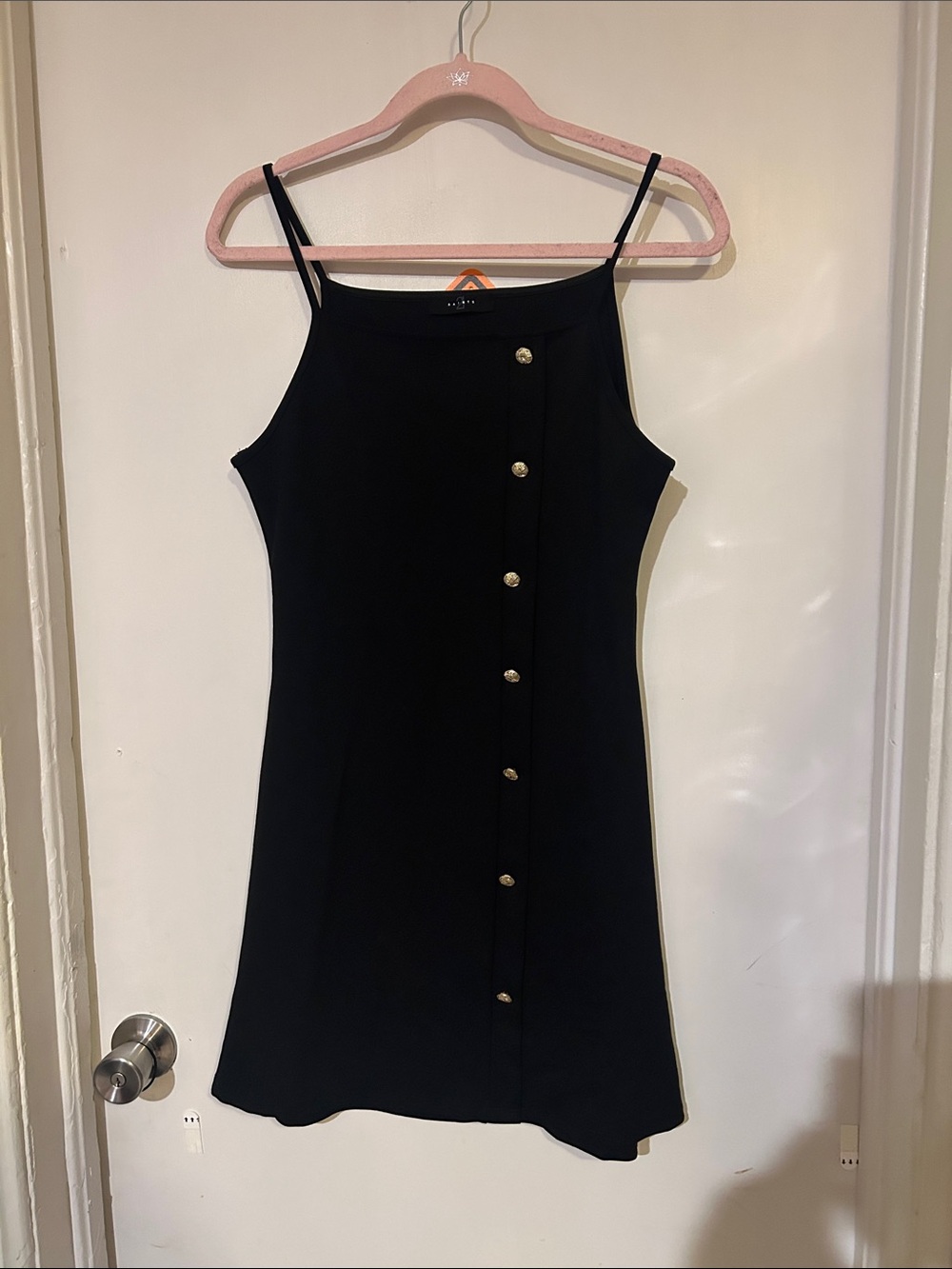 Sleeveless Black Button-Front Mini Dress